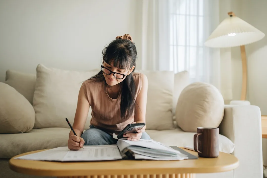 Woman reviews bills