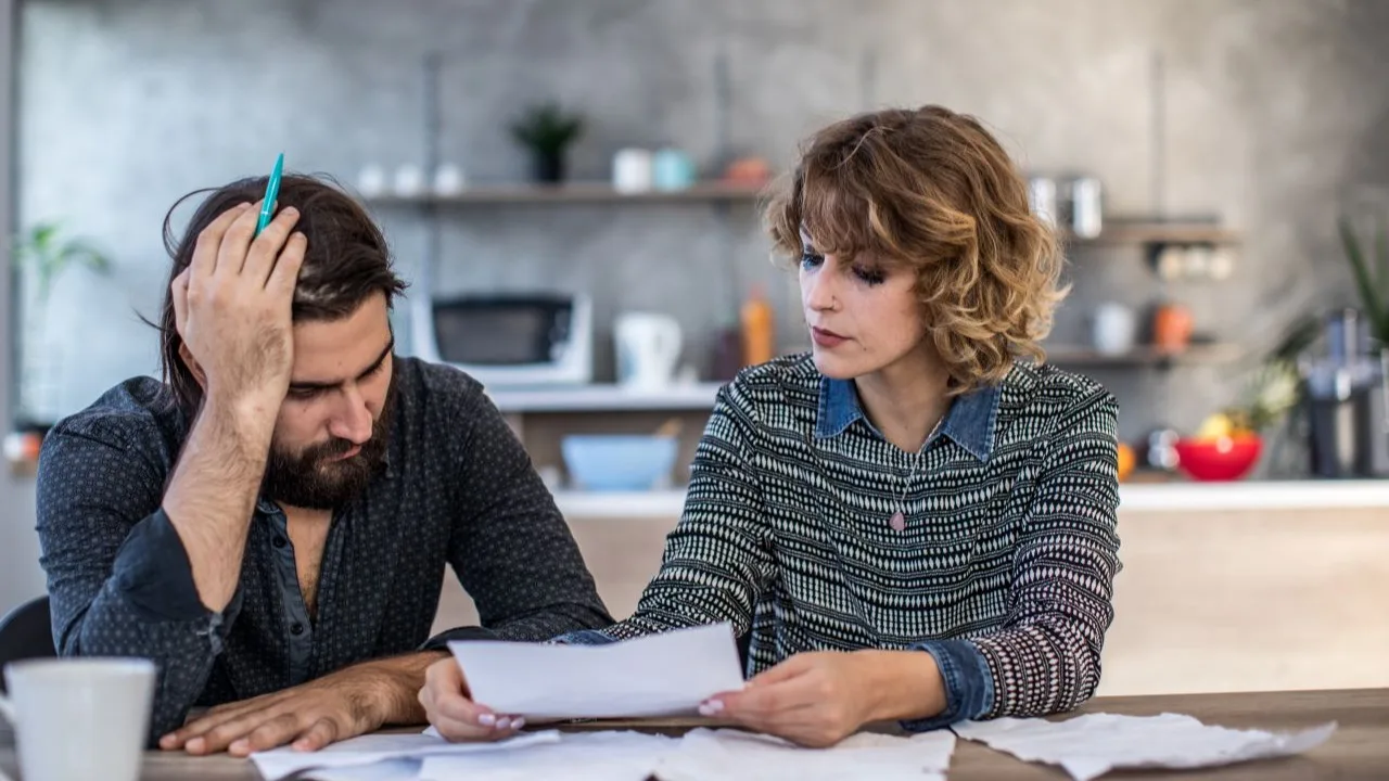Married couple having financial problems at home.