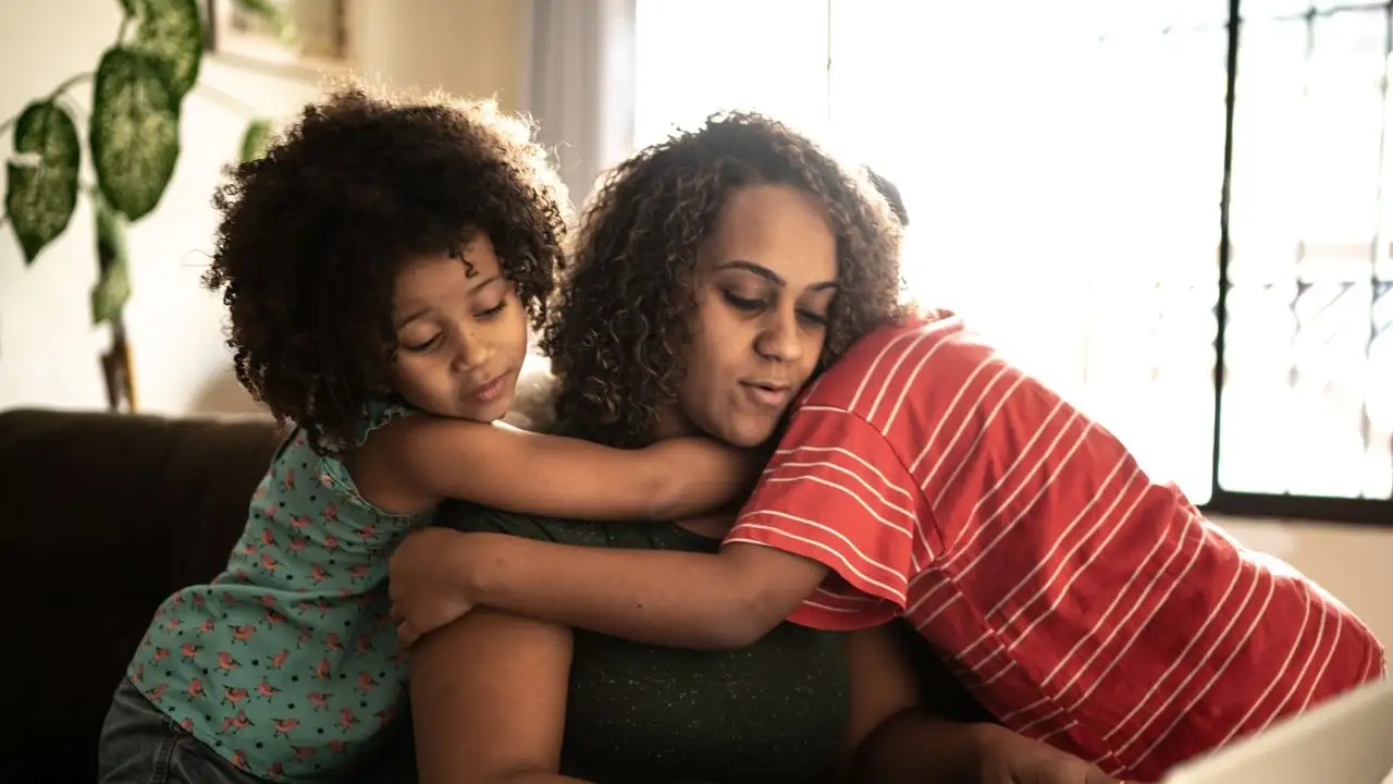 Mother trying to work with kids annoying her at home